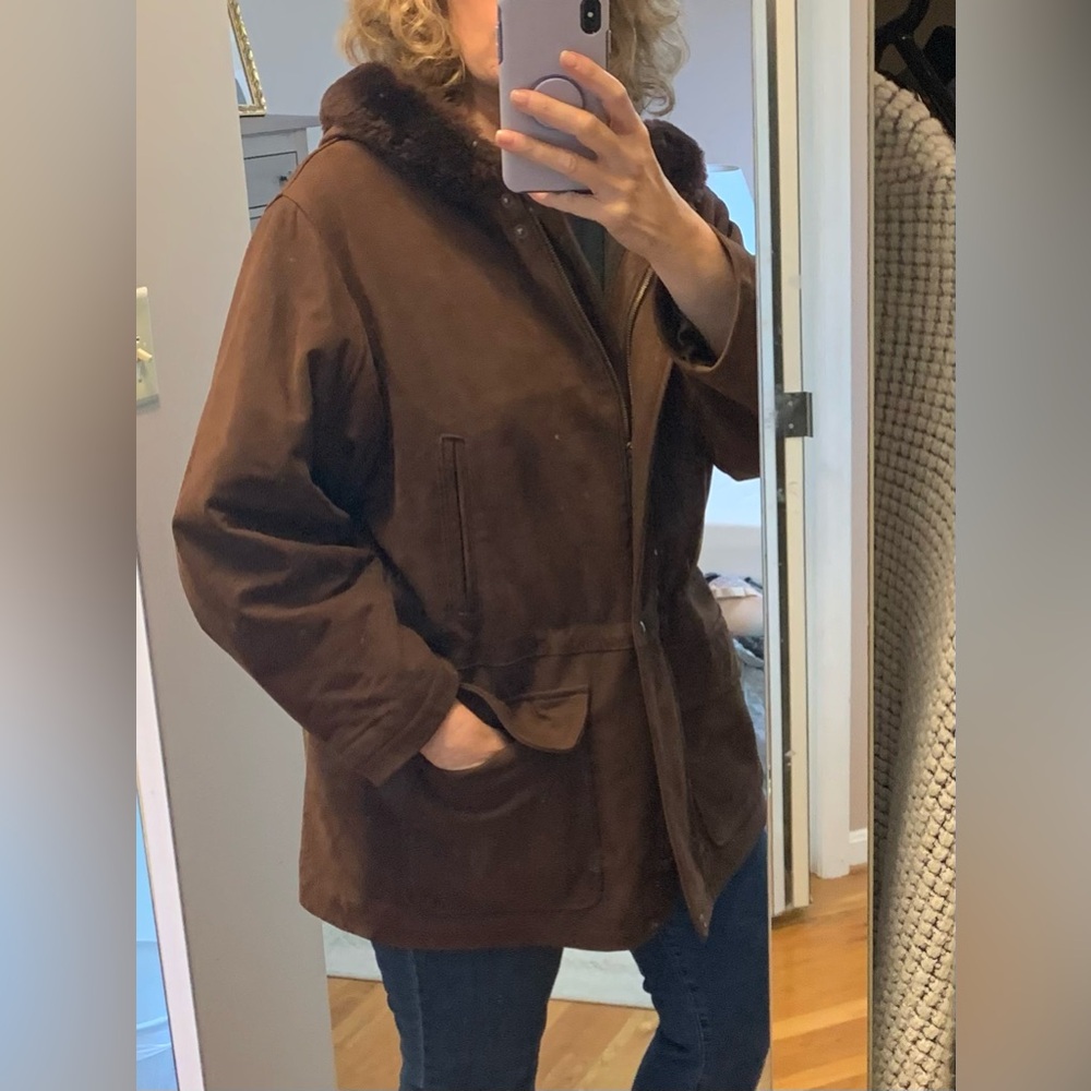 Coach, like new lines warm jacket. Hand crafted and numbered.  Size Large.